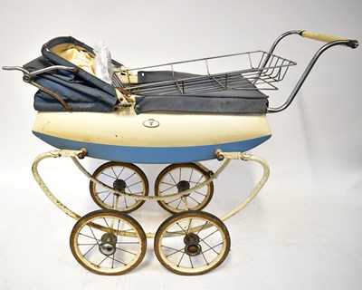 Lot 375 - A vintage dolls' coach built pram in blue and...