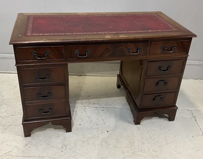 Lot 87 - A reproduction mahogany twin pedestal desk,...