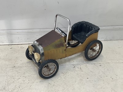 Lot 1618 - A yellow painted child's pedal car, 80cm.