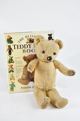 Lot 1580 - MERRYTHOUGHT; a vintage teddy bear, length...