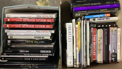 Lot 2416 - THE BEATLES; a collection of books, to include...