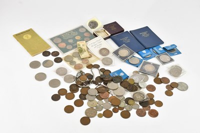 Lot 1159 - A small collection of coins including a...