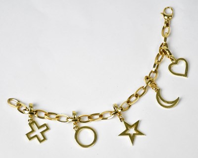 Lot 848 - THEO FENNEL; an 18ct gold charm bracelet set...