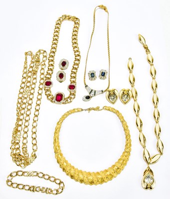 Lot 574 - CHRISTIAN DIOR; a signed long gold tone heavy...