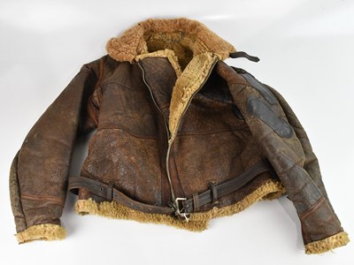 Lot 573 - A World War II leather and sheepskin flying...