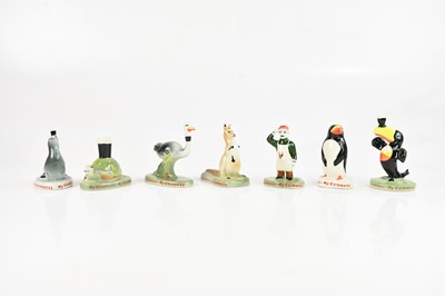 Lot 1330 - CARLTON WARE; a set of seven Guinness figures...