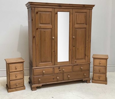 Lot 61 - A modern pine wardrobe with mirror and two...