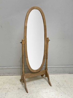 Lot 2095 - A modern pine oval cheval mirror, height 156cm.