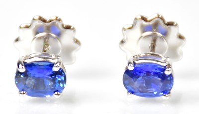 Lot 723 - A pair of 18ct white gold stud earrings, each...