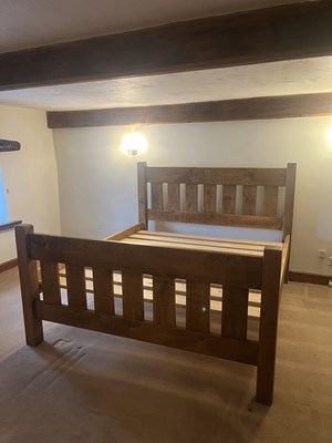 Lot 2118 - A near pair of modern pine beds, height 141cm,...