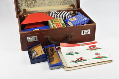 Lot 1596 - BAYKO; a collection of part house sets, with a...