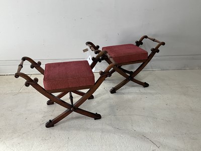 Lot 2014 - A pair of Regency oak X-framed stools with...