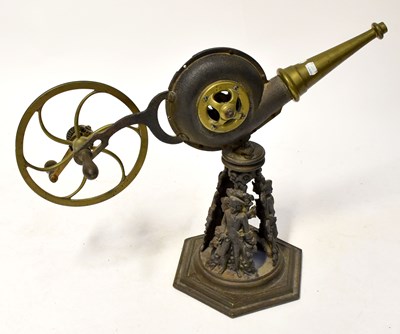 Lot 692 - A pair of brass and cast metal fireplace...