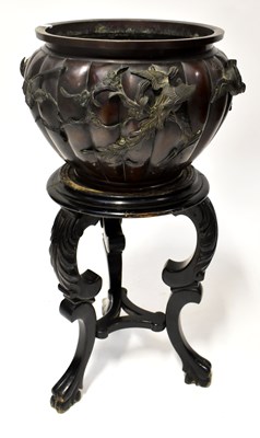 Lot 205 - A Japanese Meiji period patinated bronze...