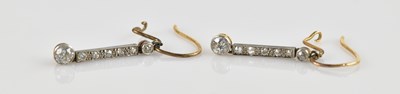 Lot 1371 - A pair of yellow metal Art Deco diamond set...