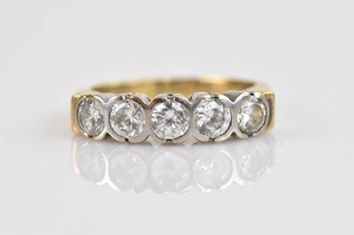 Lot 2364 - A 9ct yellow and white gold dress ring, set...