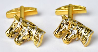 Lot 940 - A pair of gold-plated cufflinks, each in the...