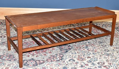 Lot 1457 - A mid century teak coffee table, 41 x 125 x 45cm.