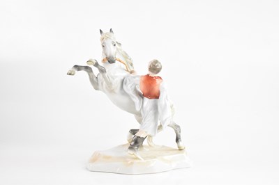 Lot 1332 - DREI FIGUREN FOR HEREND; a porcelain figure...