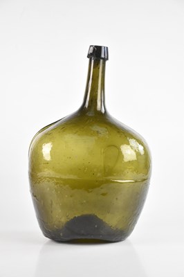 Lot 1353 - A 19th century black glass wine bottle, with...