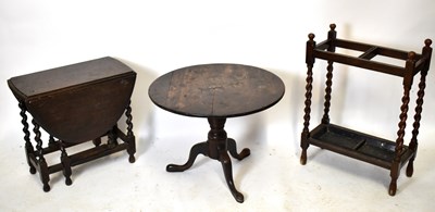 Lot 1644 - An oak barleytwist stick stand