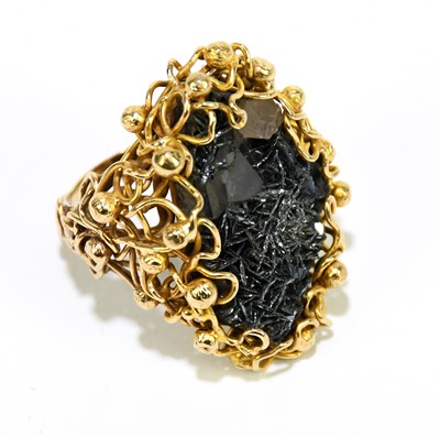 Lot 1015 - IN THE STYLE OF JOHN DONALD; a 9ct yellow gold...