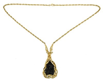 Lot 1296 - IN THE STYLE OF JOHN DONALD; a 9ct yellow gold...
