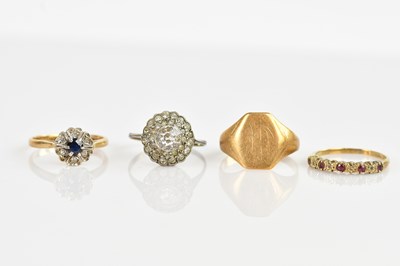 Lot 2494 - A 9ct gold diamond and sapphire cluster ring,...