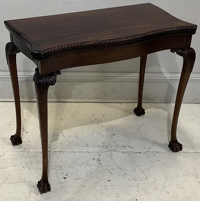 Lot 2053 - A 19th century style carved mahogany foldover...