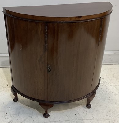 Lot 2075 - An early 20th century mahogany demi-lune...