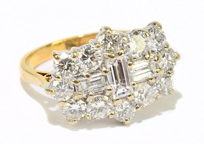 Lot 1005 - An 18ct yellow gold and diamond cluster ring...