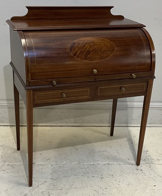 Lot 2130 - A reproduction inlaid mahogany cylinder bureau,...