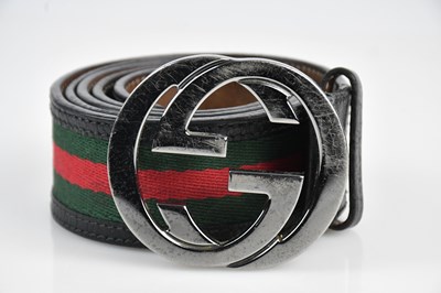 Lot 96 - GUCCI; a black calfskin leather belt, with...