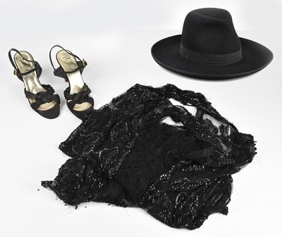 Lot 259 - A knee length black silk fully beaded 1920s...