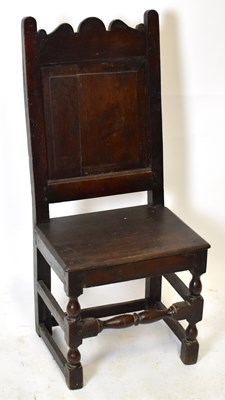 Lot 1694 - An 18th century oak back stool