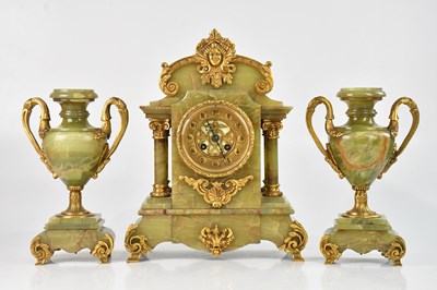 Lot 2179 - An early 20th century gilt brass mounted onyx...