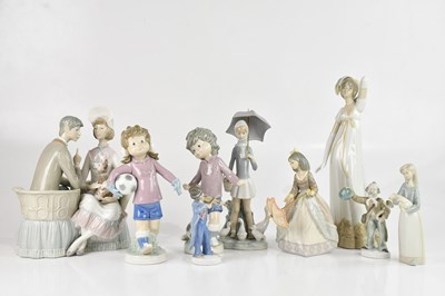 Lot 1341 - LLADRO; a collection of six figures including...