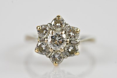 Lot 2255 - An 18ct white gold diamond set cluster ring,...