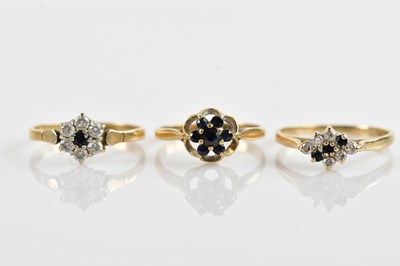 Lot 659 - Three 9ct gold rings, two set with sapphire...