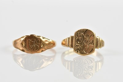 Lot 682 - Two 9ct gold signet rings, one cut, combined...