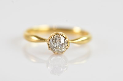 Lot 362 - A yellow metal white stone solitaire ring,...