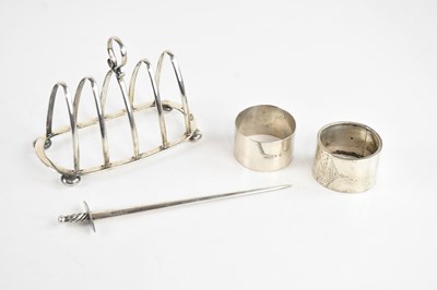 Lot 281 - A hallmarked silver four division toast rack,...