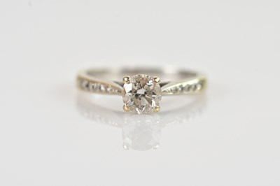 Lot 2282 - A white metal solitaire diamond ring, the...