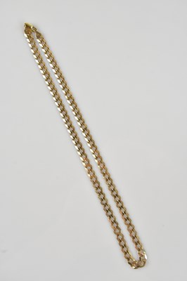 Lot 2079 - A yellow metal flat curb link necklace,...