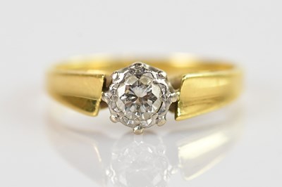 Lot 2449 - An 18ct gold diamond solitaire ring, stamped...