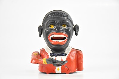 Lot 309 - A Jolly money bank.