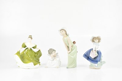 Lot 1154 - LLADRÓ; three figures comprising girl holding...