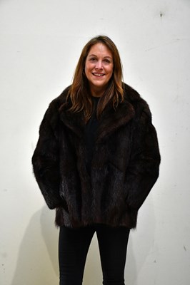 Lot 326 - A short dark brown mink fur coat, fully lined,...