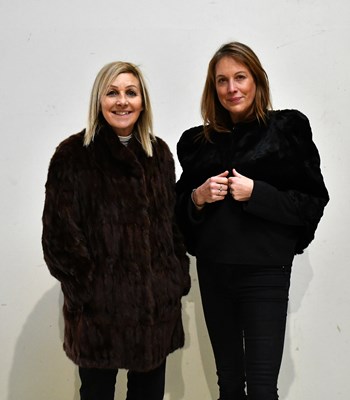 Lot 117 - A short brown rabbit fur jacket and a black...