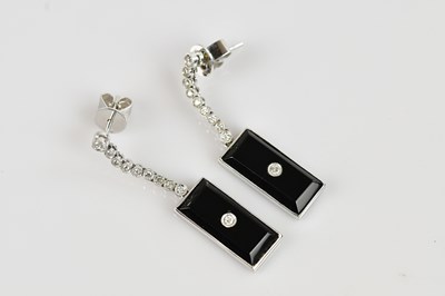 Lot 1364 - A pair of Art Deco white metal diamond and...